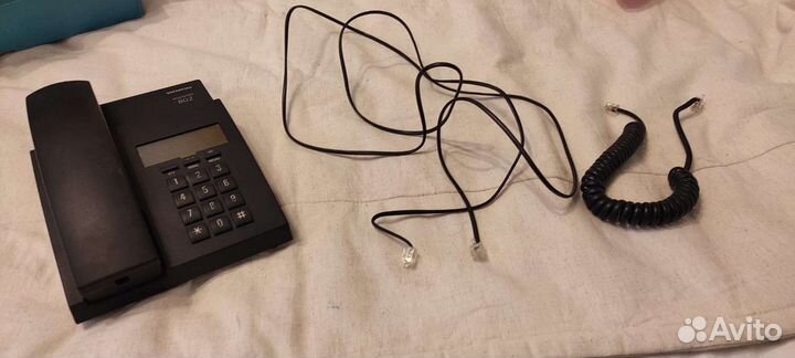 Проводной телефон