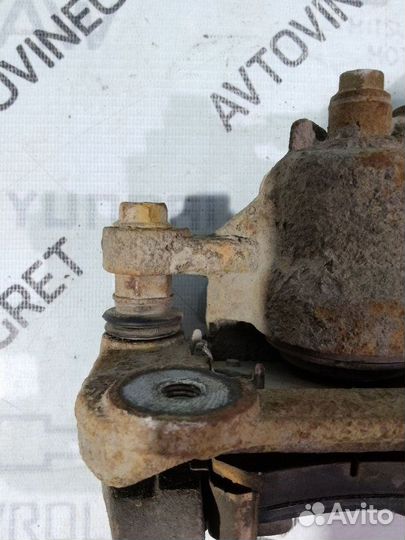 Суппорт тормозной задний Kia Cerato 1