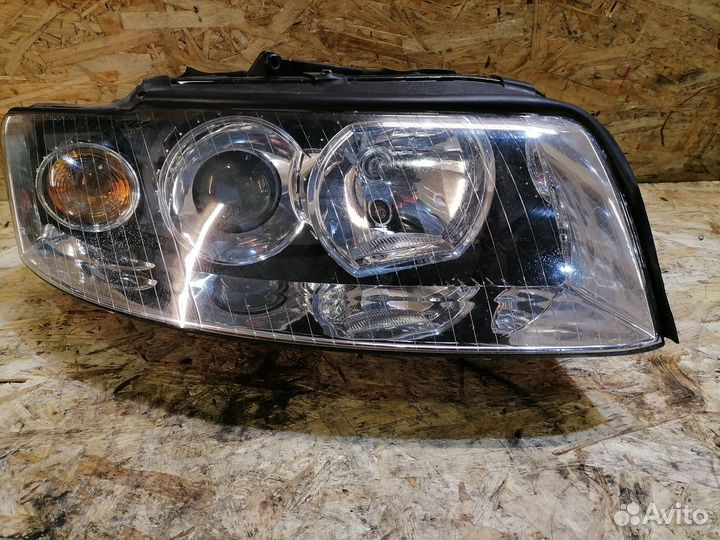 Фара правая ксенон Audi A4 B6 дефект