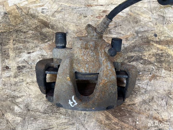 Суппорт тормозной передний левый Renault Sandero