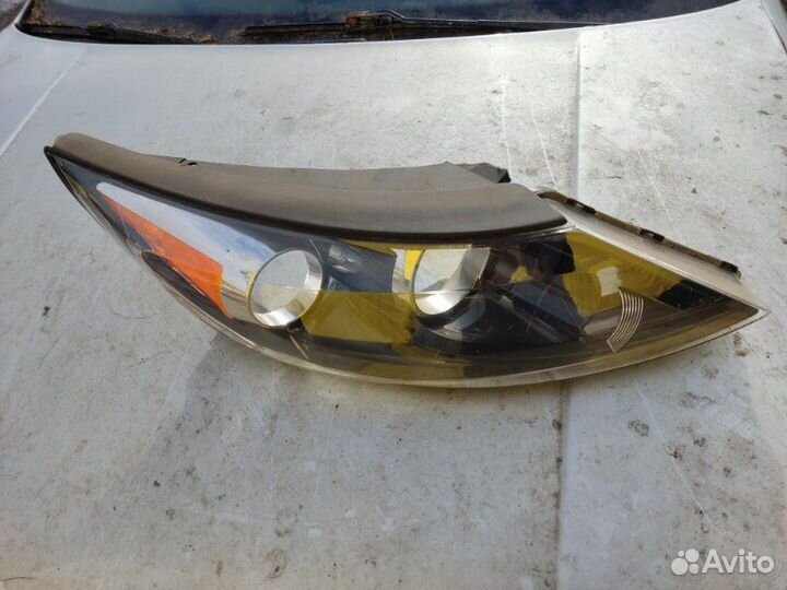 Стекло фары правое Kia Sportage 3 2011