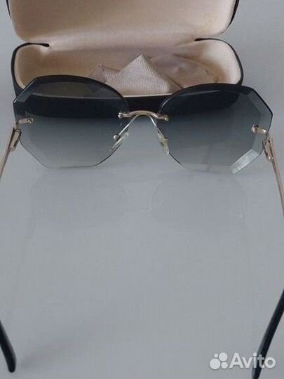 Солнцезащитные очки Valentin Yudashkin женсеие