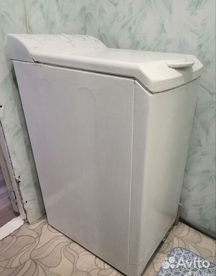 Стиральная машина с вертикальной загрузкой
