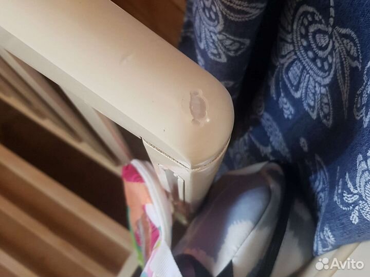 Детская кроватка с маятником