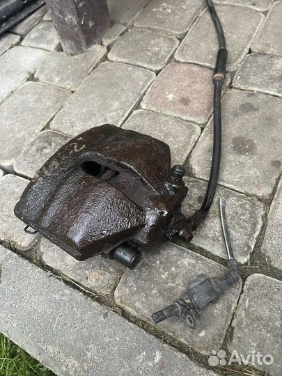 Суппорт передний WV Passat B6