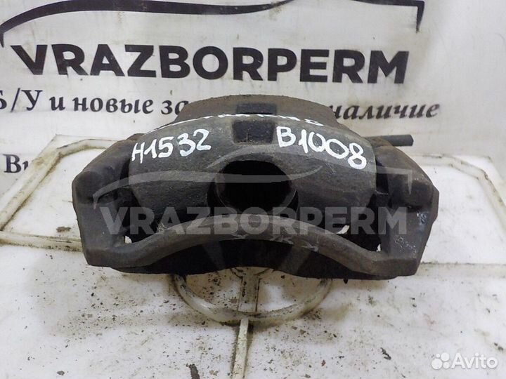 Суппорт тормозной передний левый Kia Spectra