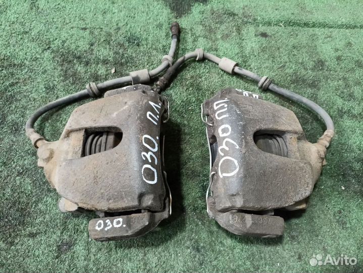 Суппорт тормозной передний правый Ford Focus II (2