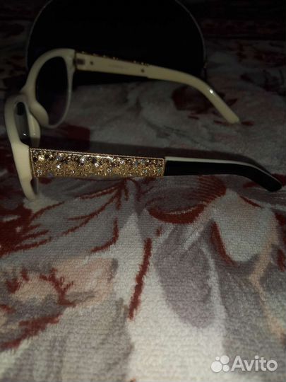 Солнцезащитные очки женские брендовые