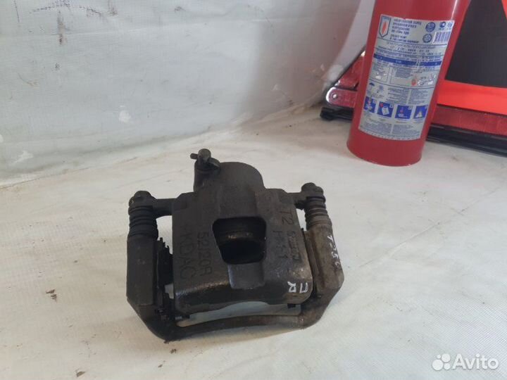 Суппорт передний правый Chevrolet Aveo T250 B12S1