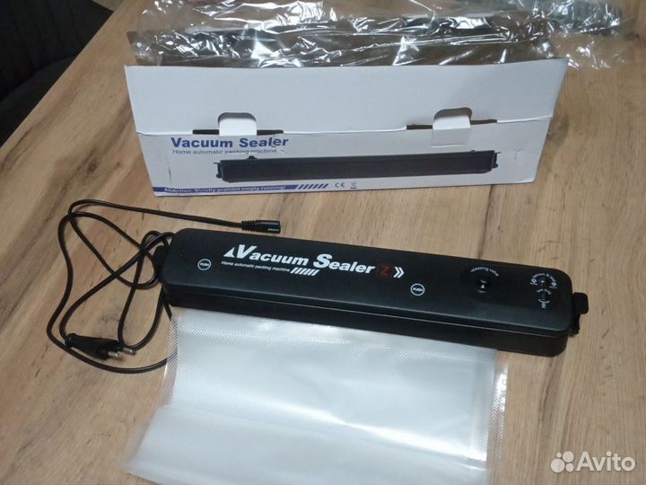 Вакуумный упаковщик
