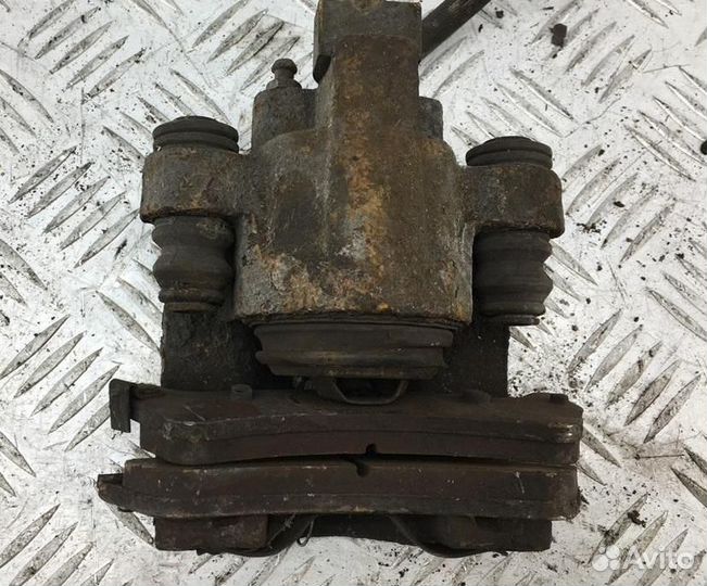 Суппорт задний левый Ford Explorer