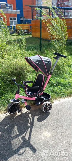 Трехколесный велосипед с ручкой