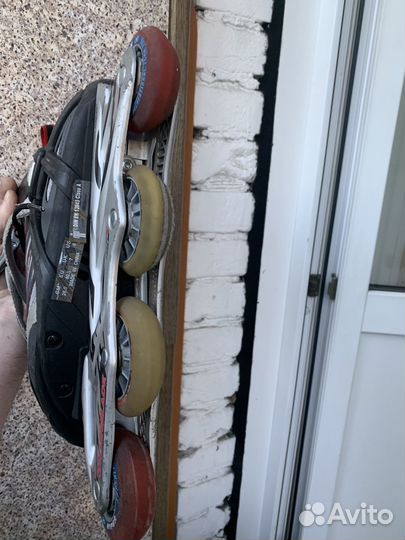 Роликовые коньки