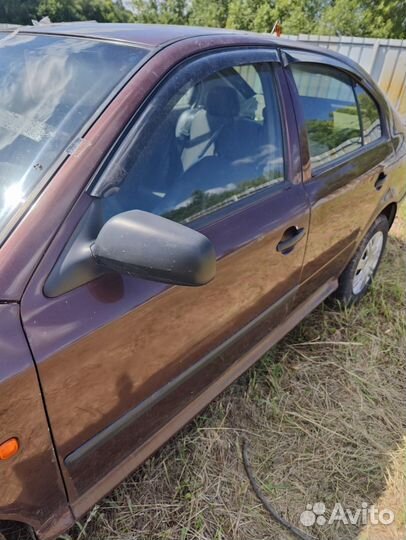 Дверь передняя левая Skoda Octavia Tour (A4)