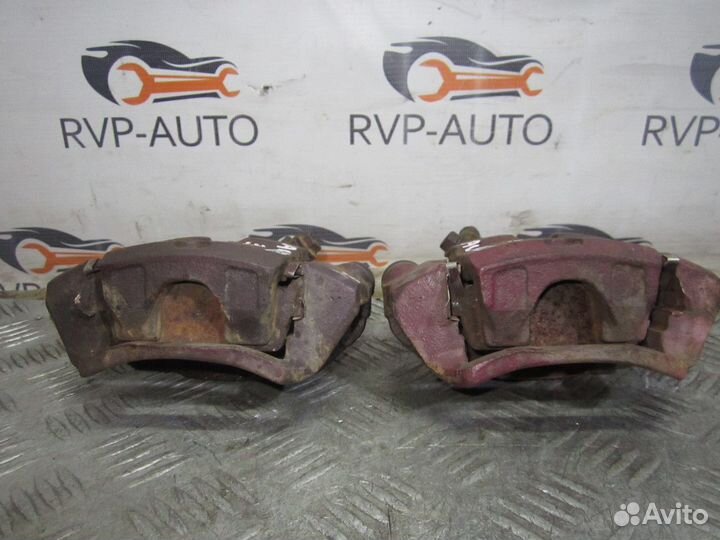 Суппорт тормозной задний Nissan Laurel C35 1997-02