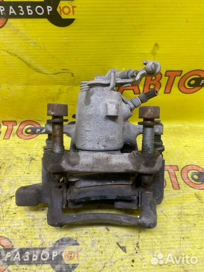 Суппорт задний правый Volkswagen Jetta 1K2 BSE