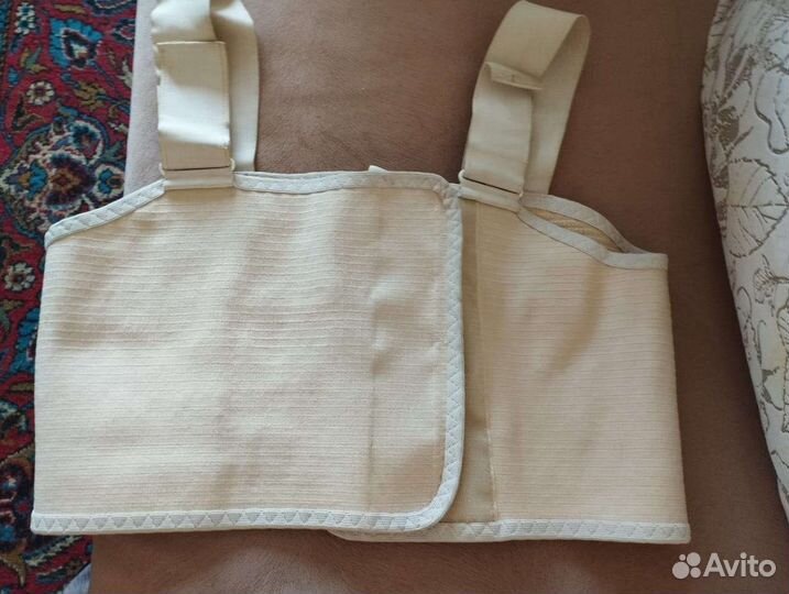 Подушка для массажа шеи и бандаж от перелома груди