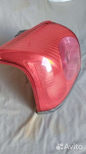 Фонарь задний левый avensis t25
