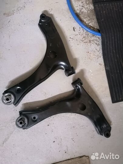 Рычаги передние Форд Торнео