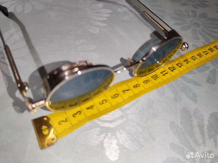 Солнечные очки круглые