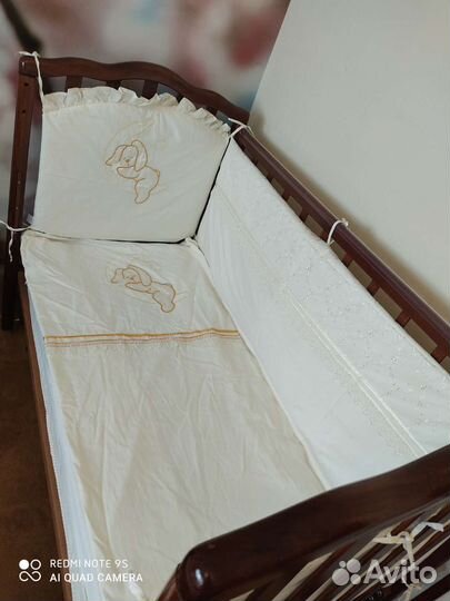 Детская кроватка с продольным маятником и матрасом