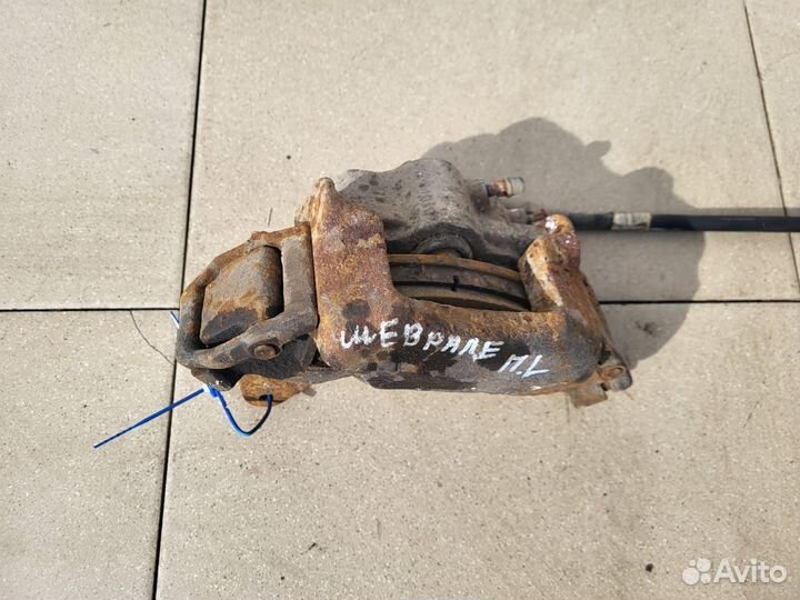 Тормозной суппорт перед лев Chevrolet Нива