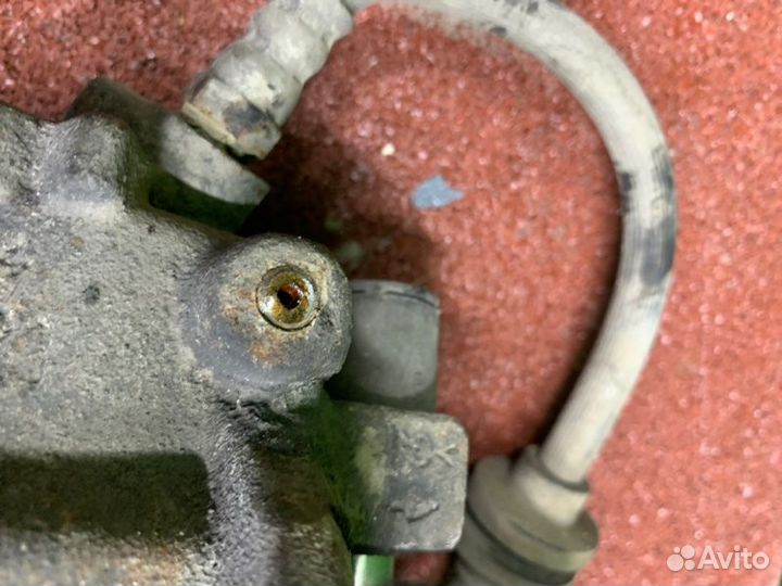 Суппорт тормозной левый Renault Logan 2 L8 1.6