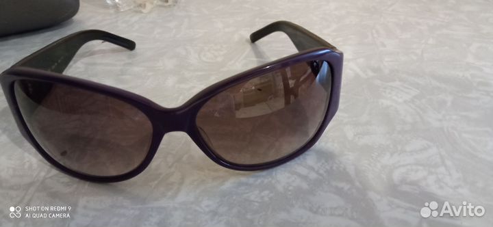 Солнцезащитные очки женские брендовые