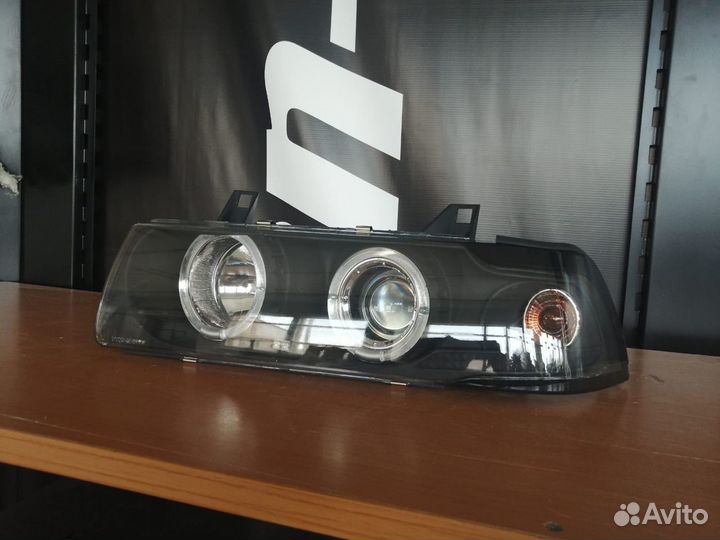 Фара левая BMW 3 серия III (E36) 91-98 BM058B3WCW