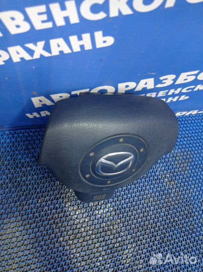 Подушка безопасности водителя Mazda Demio 2