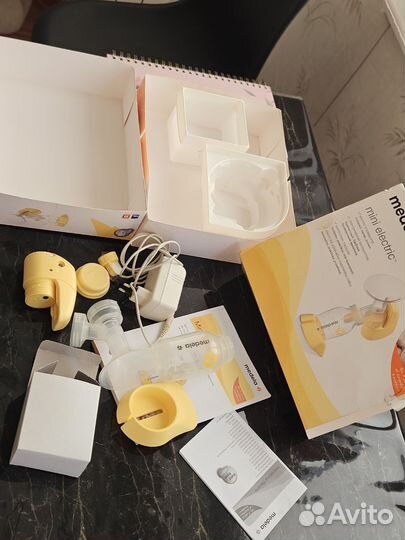 Молокоотсос medela электрический