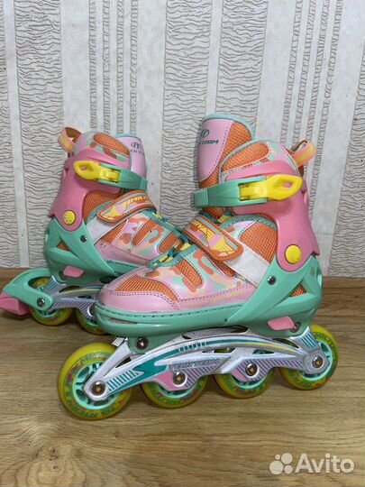 Раздвежные роликовые коньки