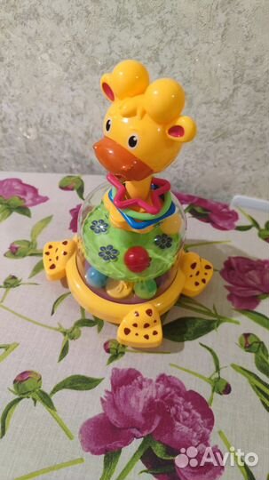 Юла жираф с вертушкой