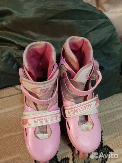 Роликовые коньки