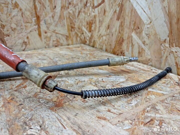 Трос стояночного тормоза центральный Renault