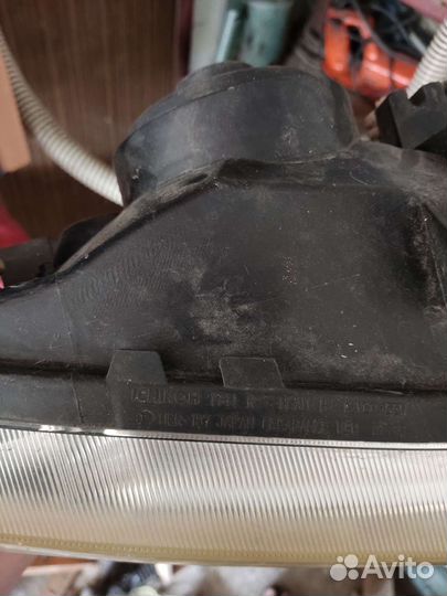 Правая фара Nissan AD Wingroad Y11 ichikoh