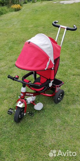 Трехколесный велосипед с ручкой