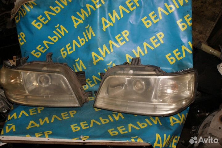 Фара Nissan Cube