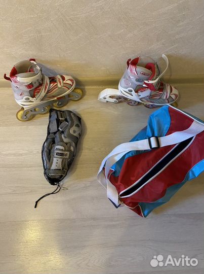 Роликовые коньки