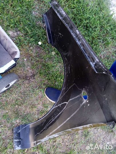 Переднее правое крыло Шевроле Лачетти