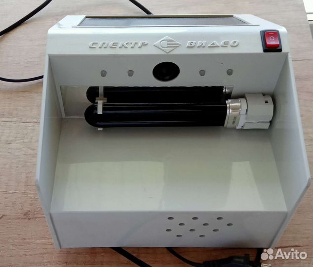 Оприделитель подлинности бумажных денег