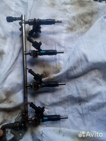 Топливная форсунка opel astra H 1.8