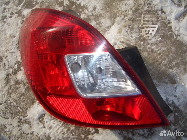 Фонарь левый Опель Корса D с06-15г