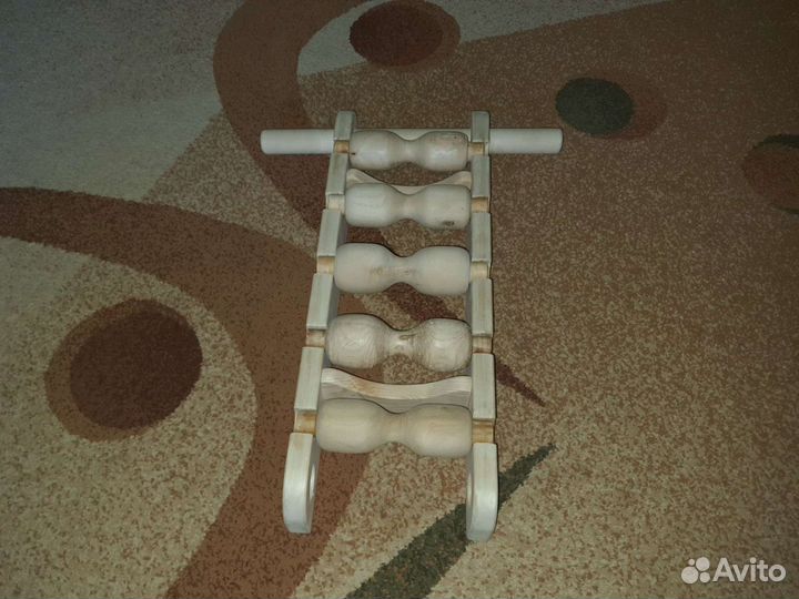 Массажер для спины из пяти роликов