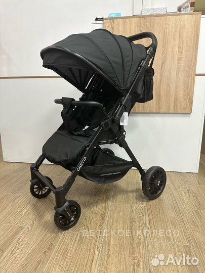 Легкая прогулочная коляска с перекидной ручкой