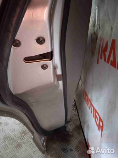 Замок двери задний левый Мазда Милления TA5P