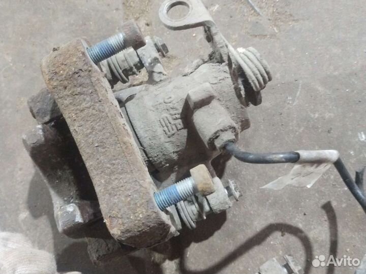 Суппорт тормозной задний левый, правый Peugeot 308