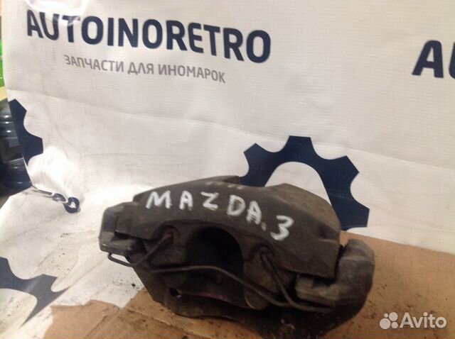 Суппорт тормозной передний правый Мазда. 3