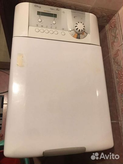 Стиральная машина с вертикальной загрузкой