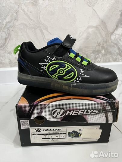 Продам кроссовки heelys